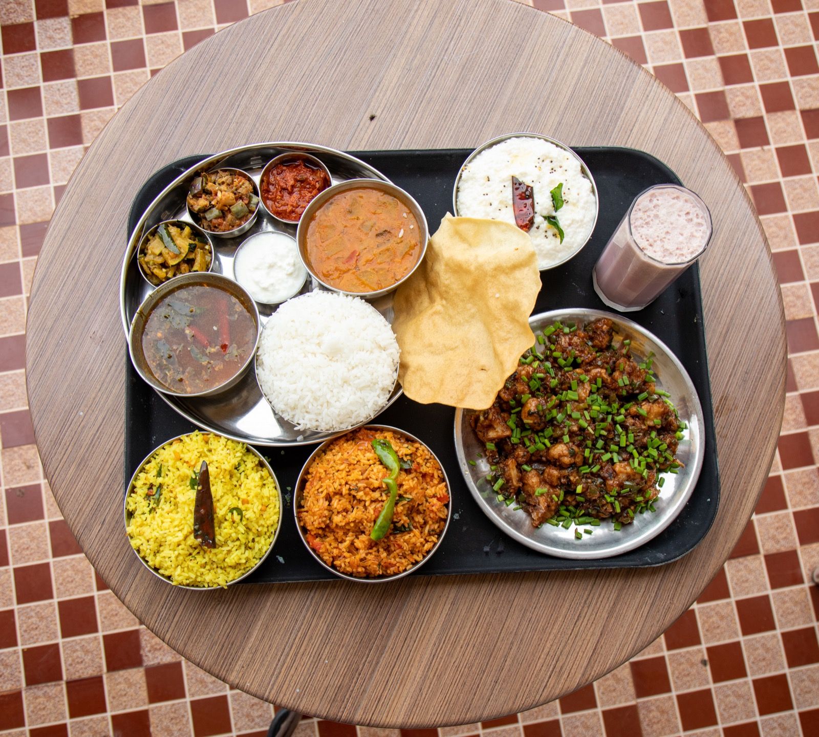 A freshly prepared home-style meal at Aakash